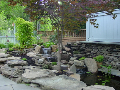 Beautiful koi fish pond construction ideas in Rochester New York (NY) by certified pond builders - Acorn